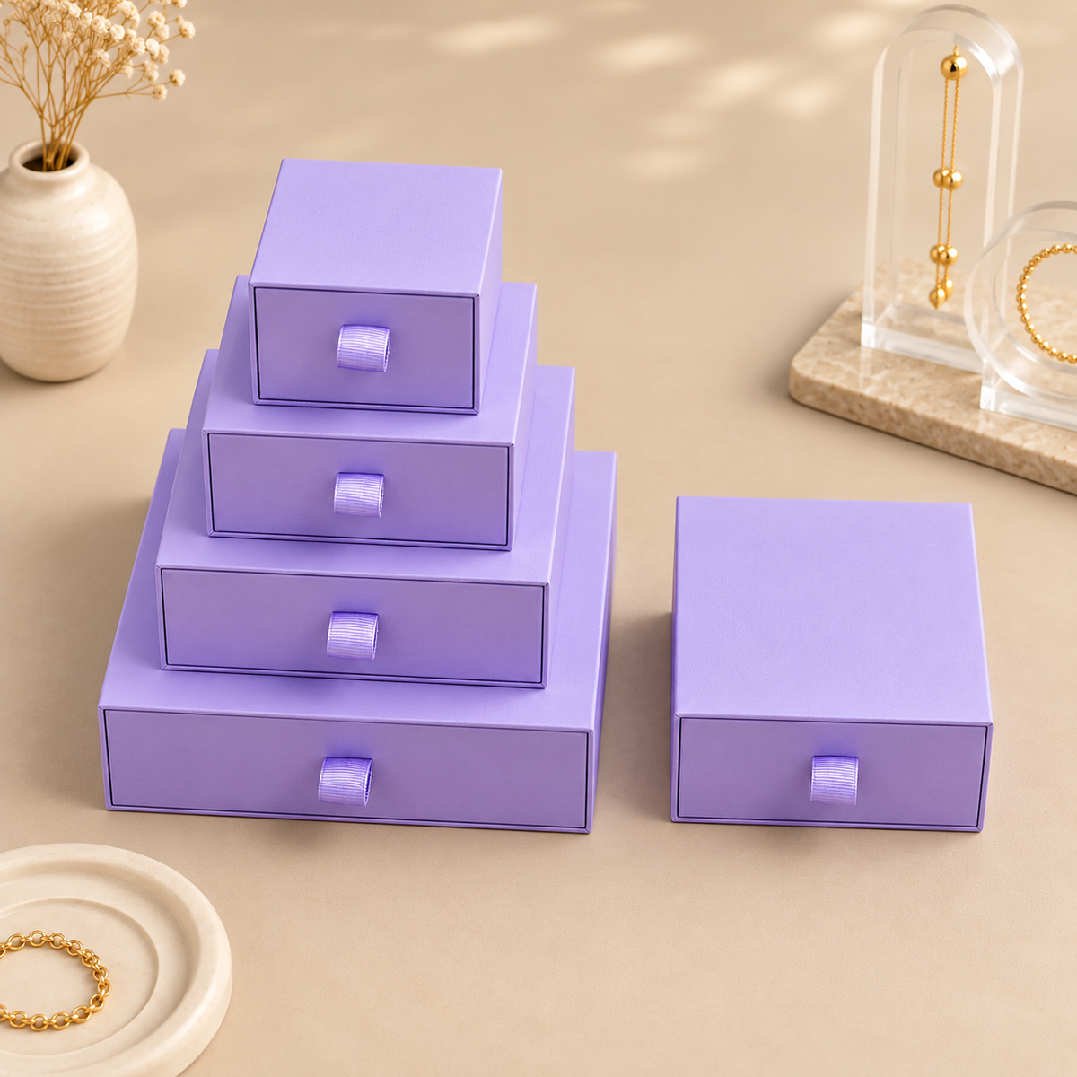 Purple paper drawer jewelry boxes in five sizes with ribbon pull tabs