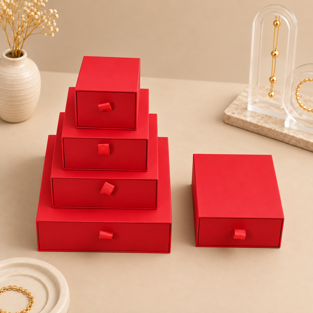 Red paper drawer jewelry boxes in five sizes with ribbon pull tabs