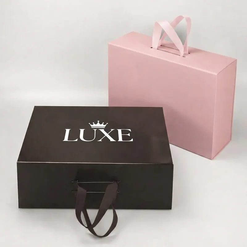 White foil logo finish example on a dark gift box