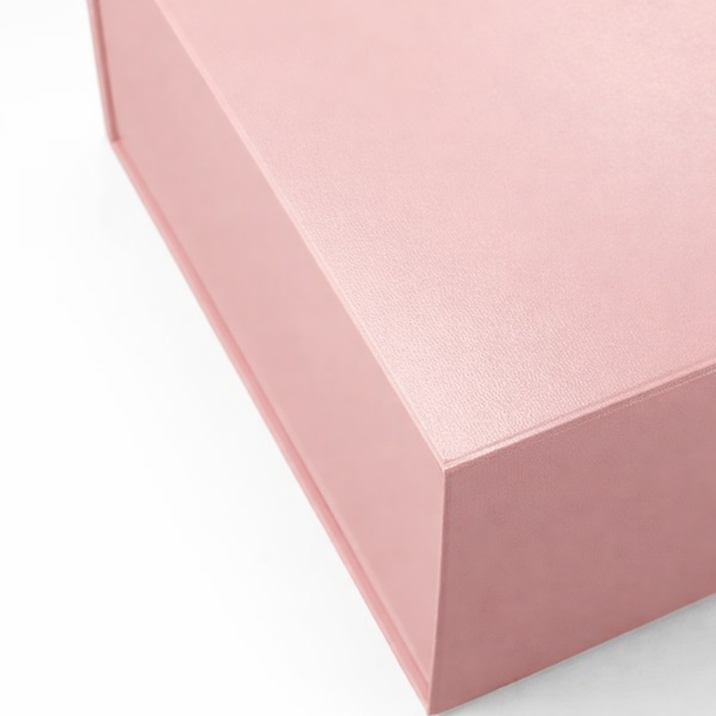 Folding box with decorative ribbon tie, sophisticated packaging for boutique products and gifts