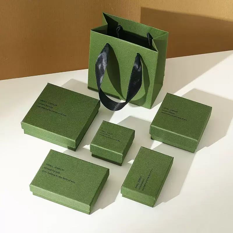 Rigid jewelry box with separate base and lid construction
