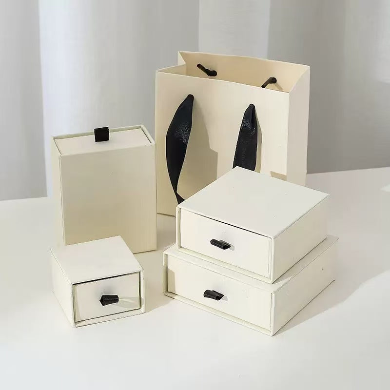 Rigid drawer box for jewelry storage with velvet lining