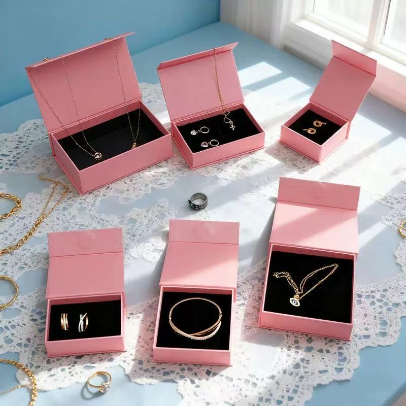 Jewelry box with multiple compartments for rings necklaces and earrings