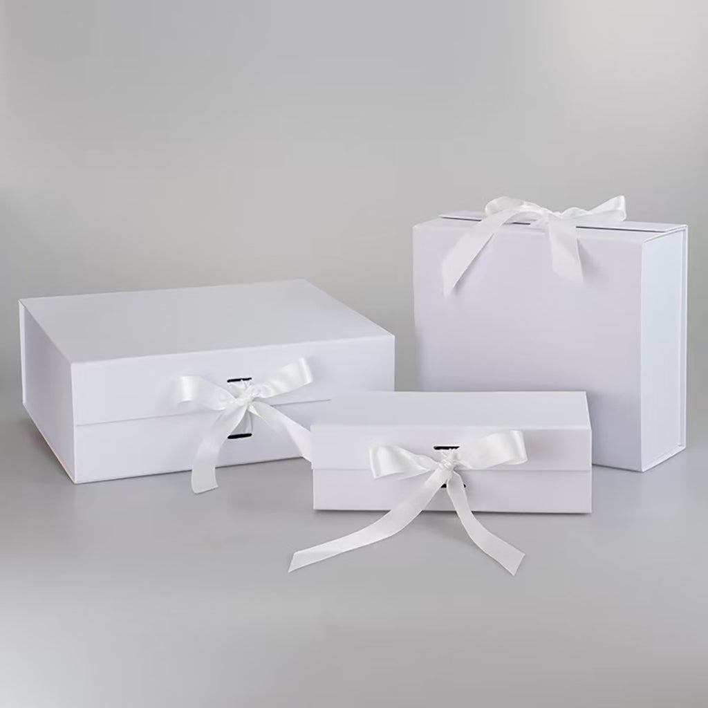 White matte finish folding box with ribbon closure for elegant gift wrapping